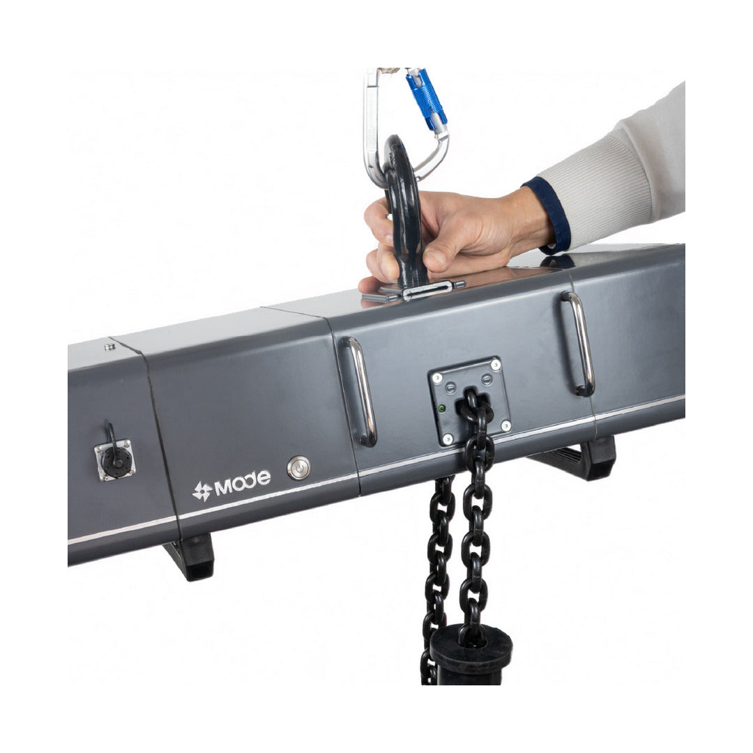 MODE FreeHoist 1 Ton electric chain hoist being rigged by a technician